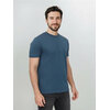 T-shirt homme uni en laine mérinos GREENBOMB, porté, coloris bleu pin