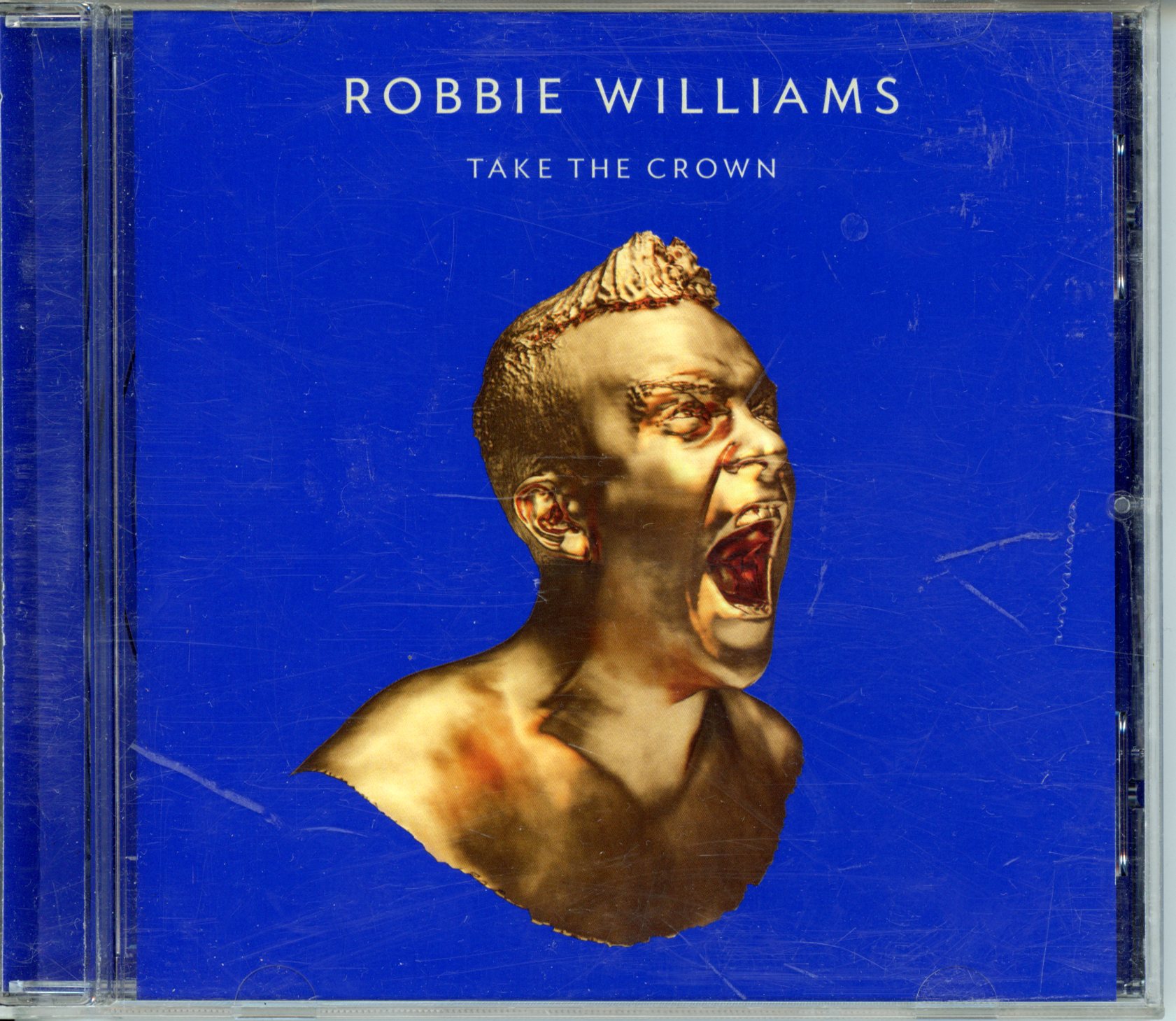 ROBBIE WILLIAMS TAKE THE CROWN