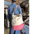 sac rose sur epaule