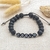 Bracelet personnalisé pierre de lave perle lettre noire