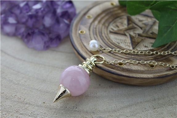 68687-Pendule Sephoroton en Quartz Rose