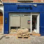 Façade de la boutique JUMCA, torréfacteur rue Maurice Berteaux à Conflans-Sainte-Honorine
