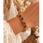 bracelet-floral-dore-sur-poignet