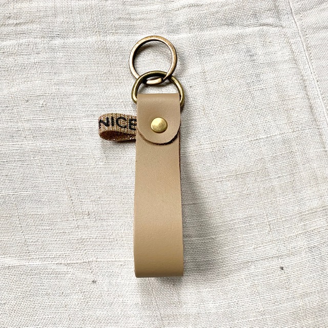 porte-clés LOU en cuir beige