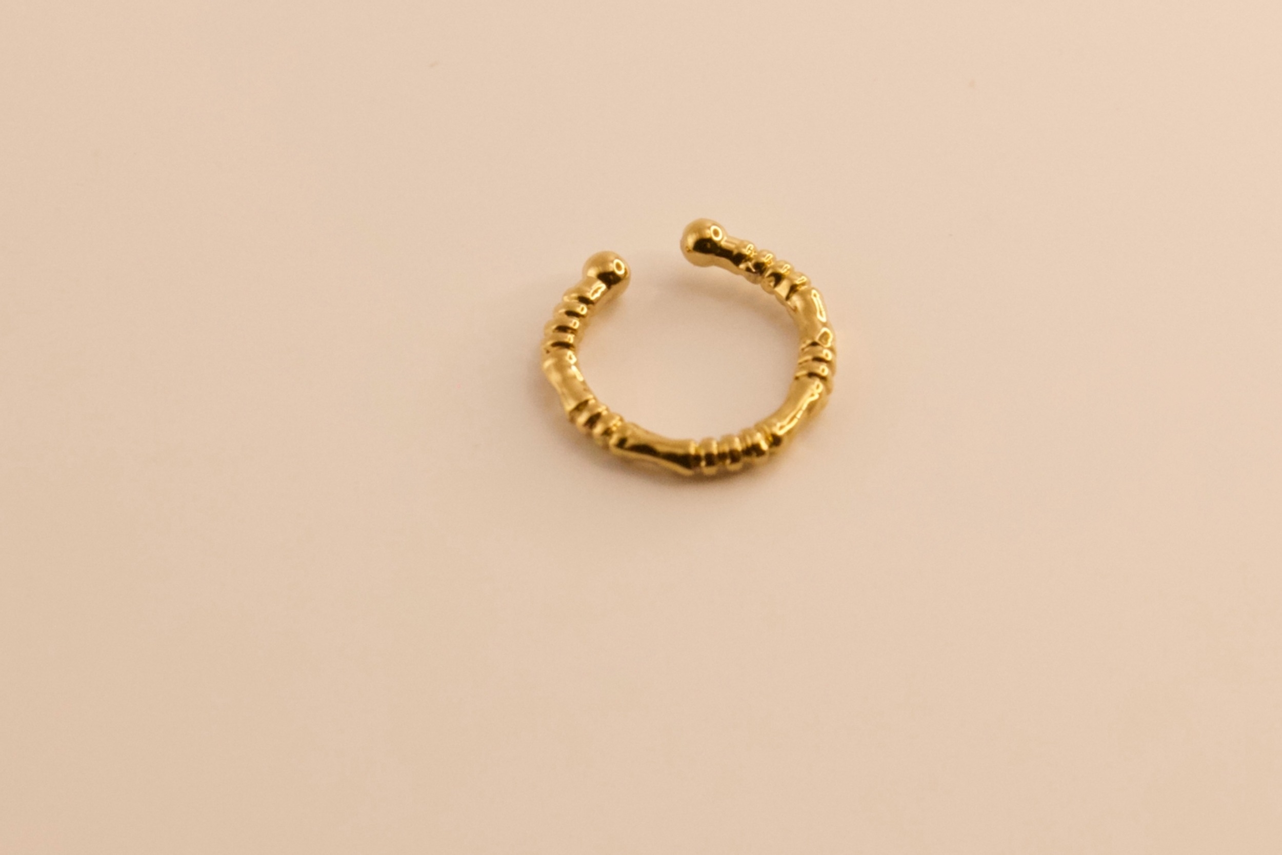 Bague doreille en acier doré