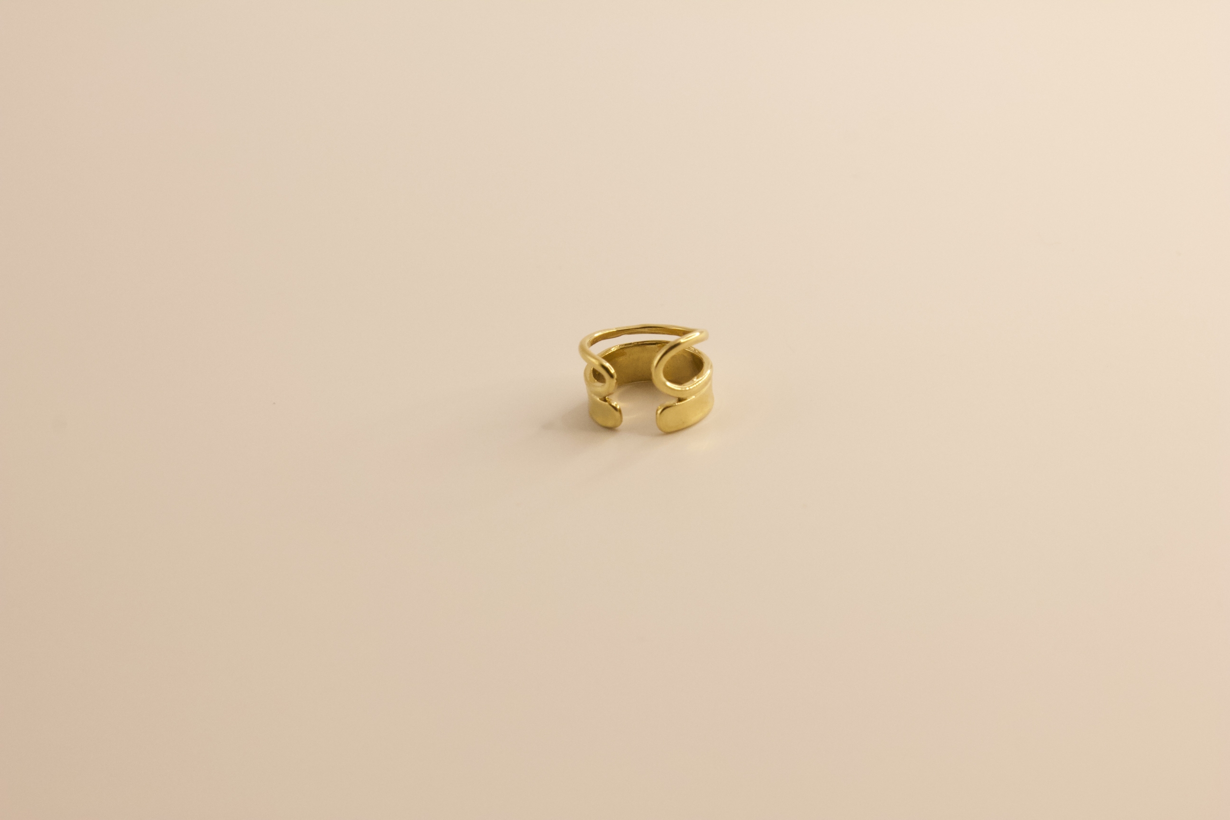 Bague doreille en acier doré