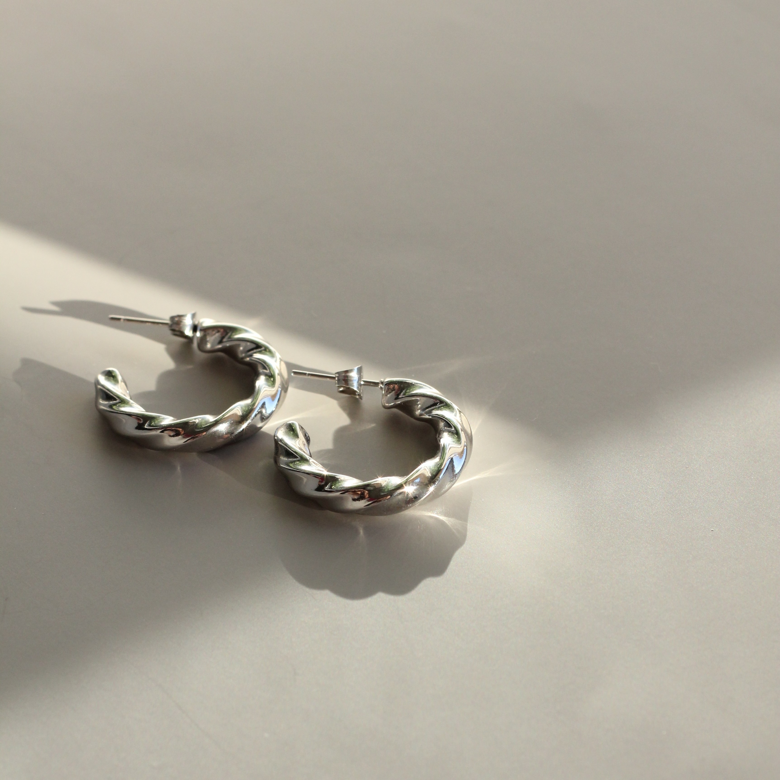Boucles doreilles en acier argenté