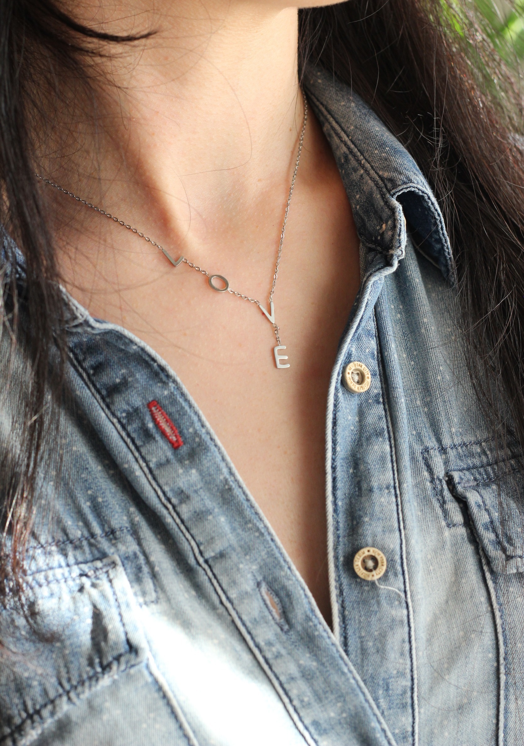 Collier lettres Love en acier inoxydable argenté