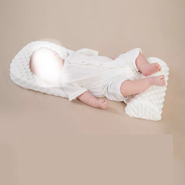 réducteur de lit bébé anti tête plate et coliques du nourrisson