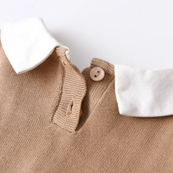Barboteuse à col claudine en coton tricoté bébé fille