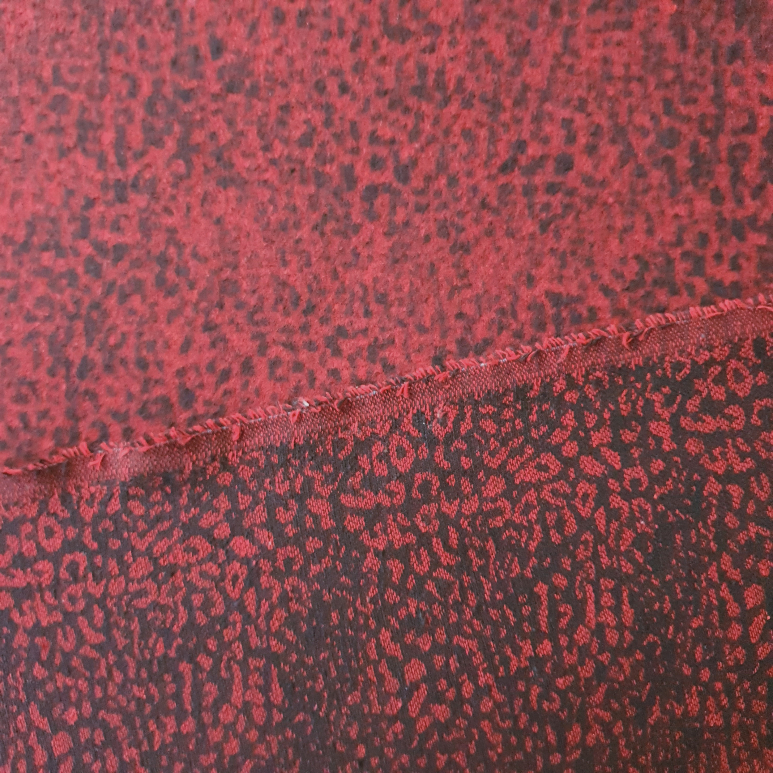 Tissu lainage léopard rouge