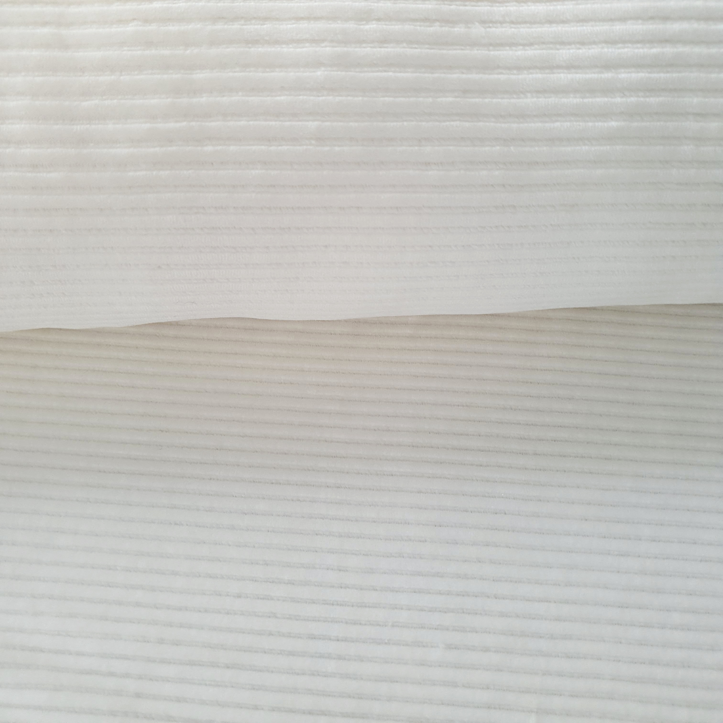 Tissu jersey côtelé velours écru