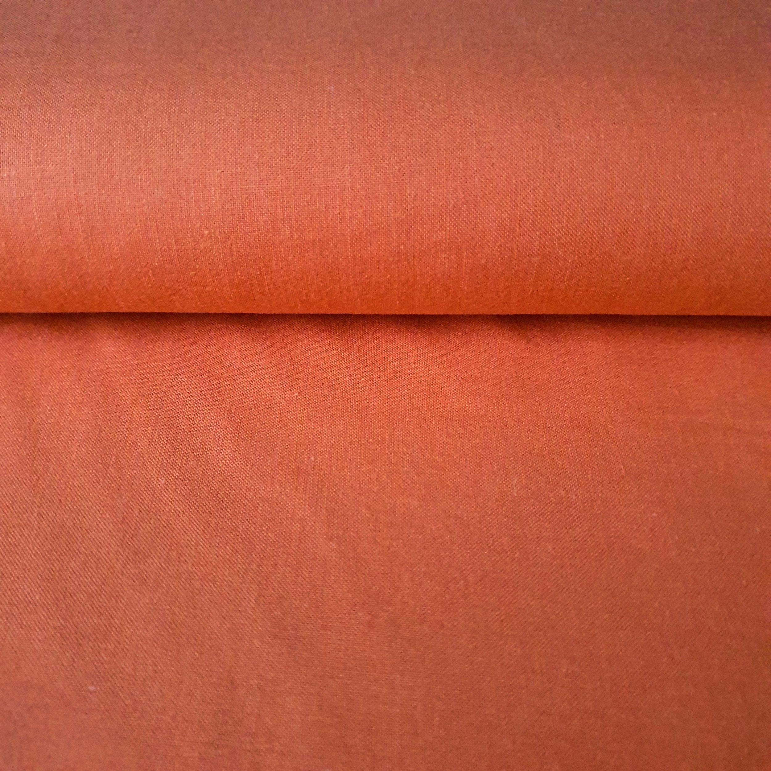 Tissu coton uni orange carotte