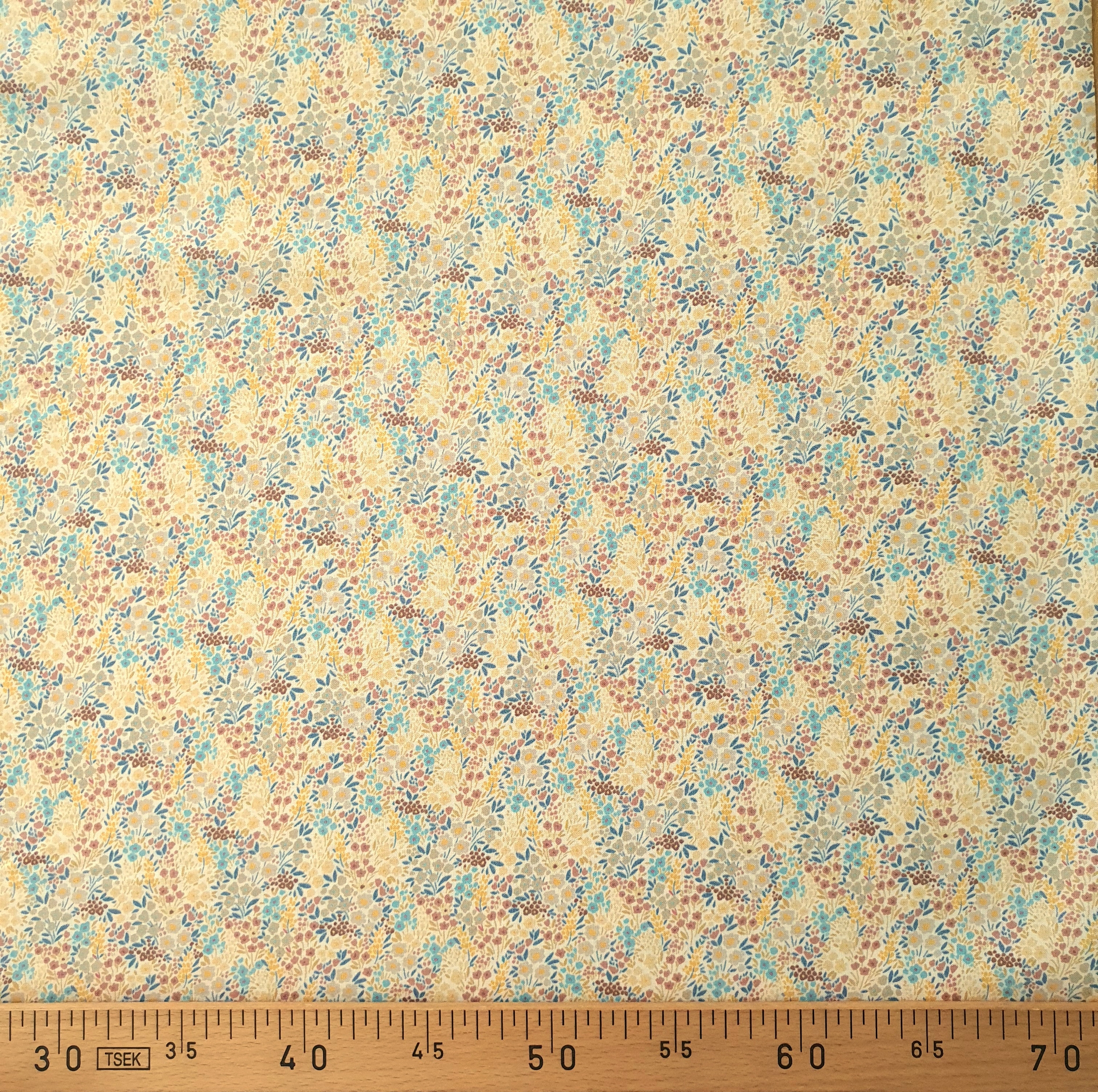 Tissu coton percale petits fleurs fond bleu, beige, marron, jaune