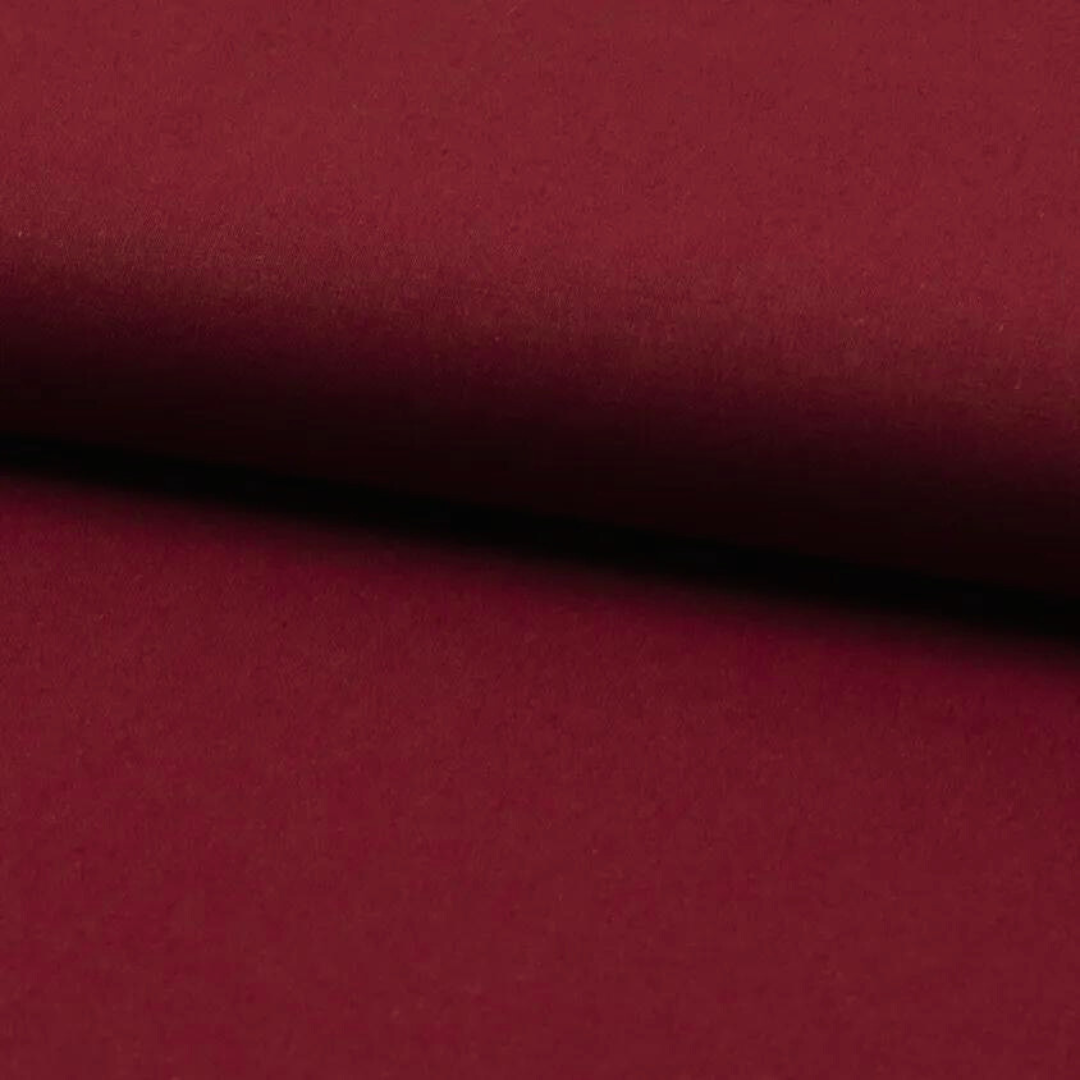 Tissu popeline coton uni rouge bordeaux
