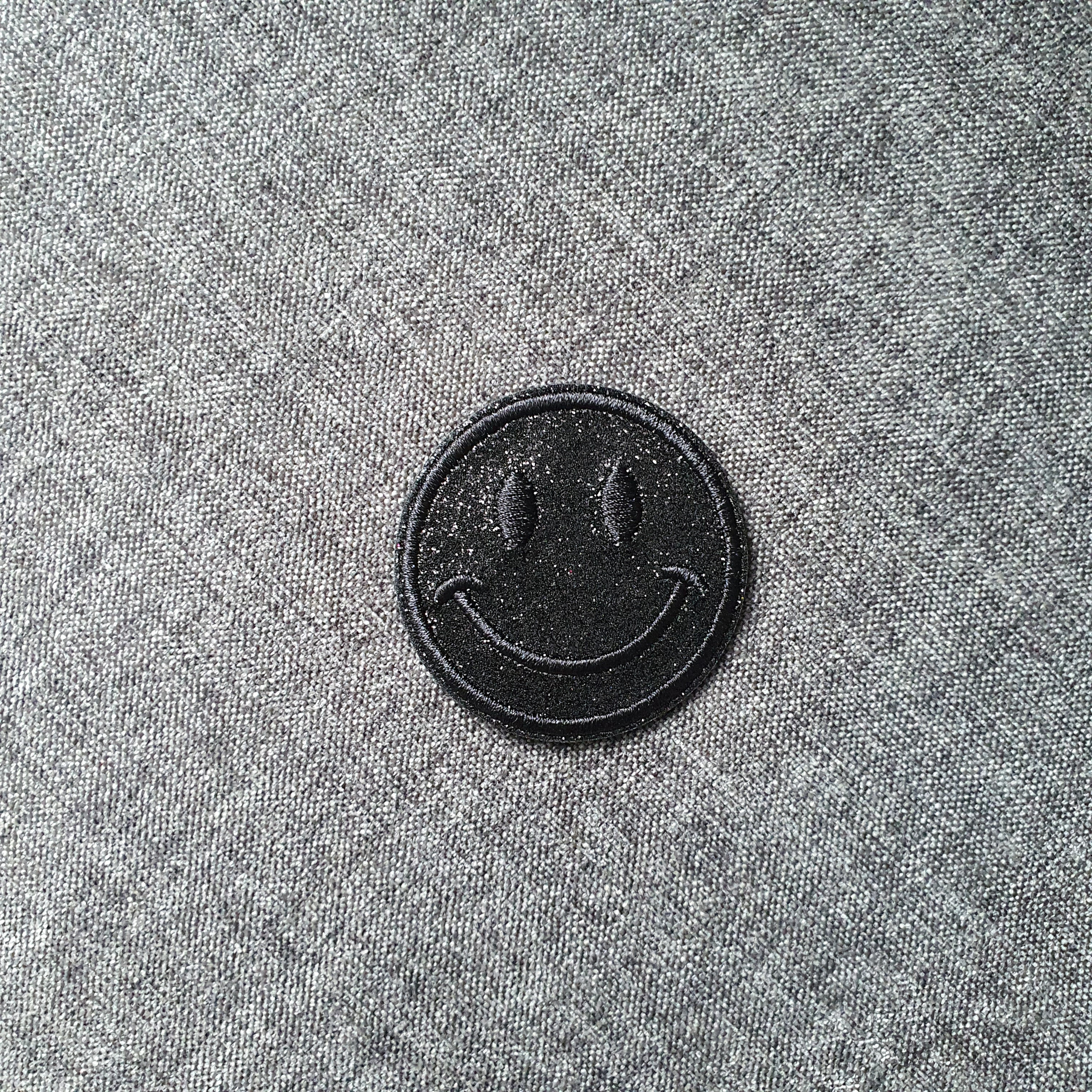 Patch thermocollant rond smiley brillant noir