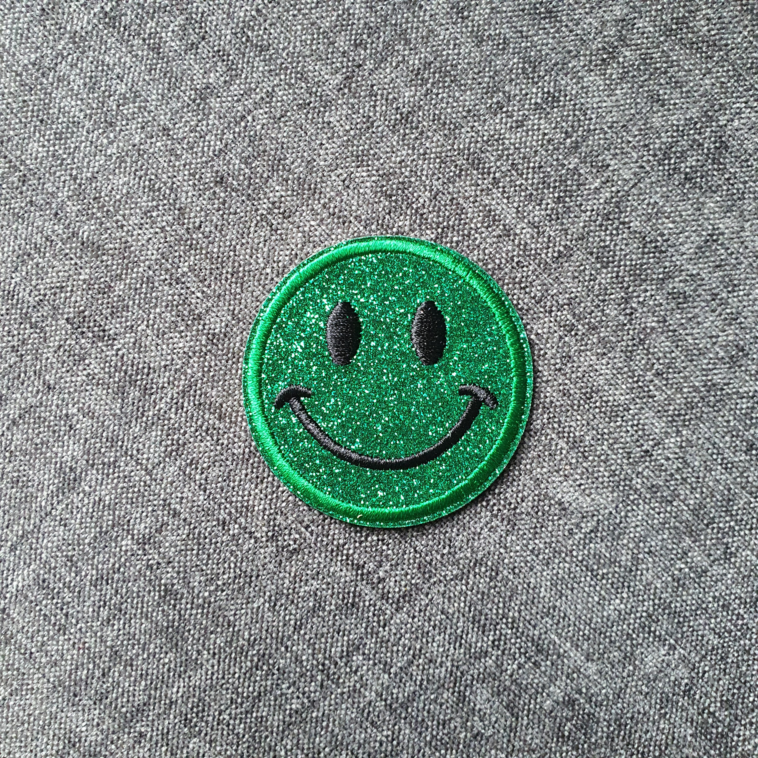 Patch thermocollant rond tête de smiley brillant vert