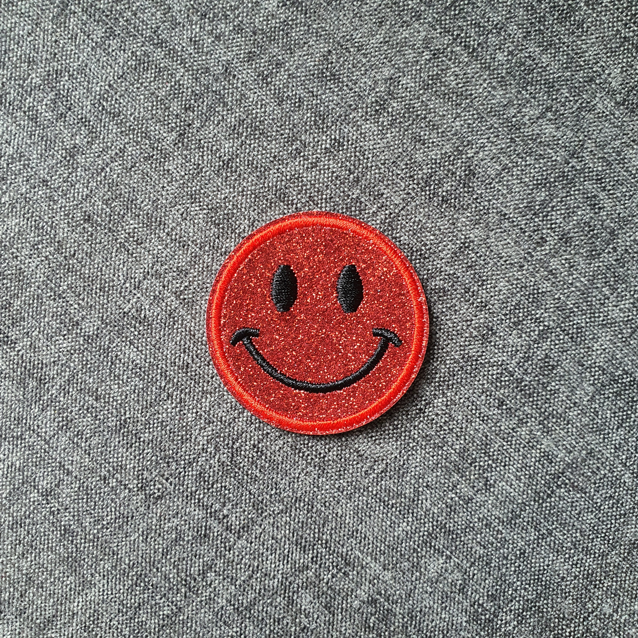 Patch thermocollant rond tête de smiley brillant rouge