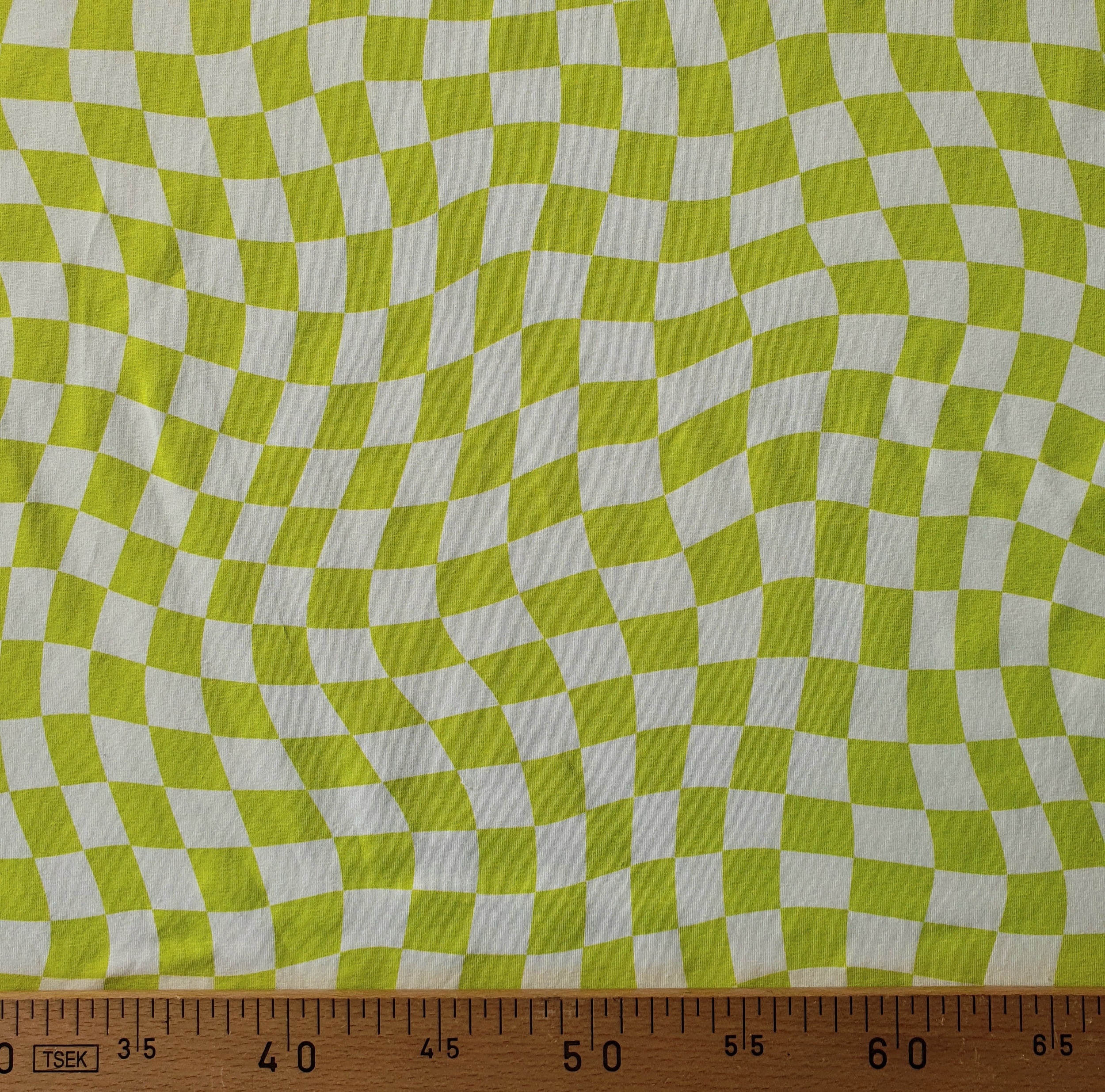 Tissu jersey damier asymétrique vert pomme et blanc (2)