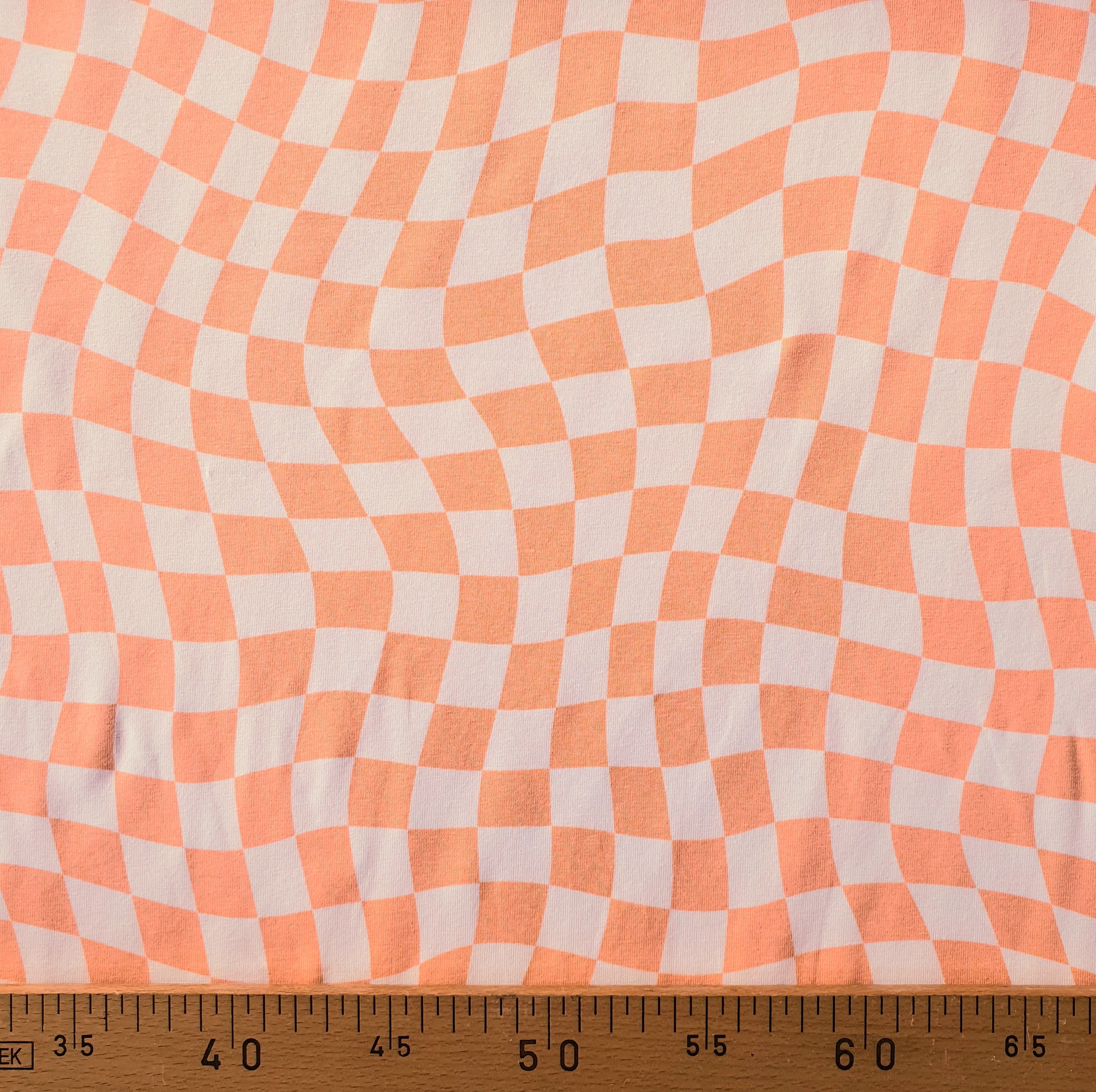 Tissu jersey damier asymétrique saumon et blanc (2)