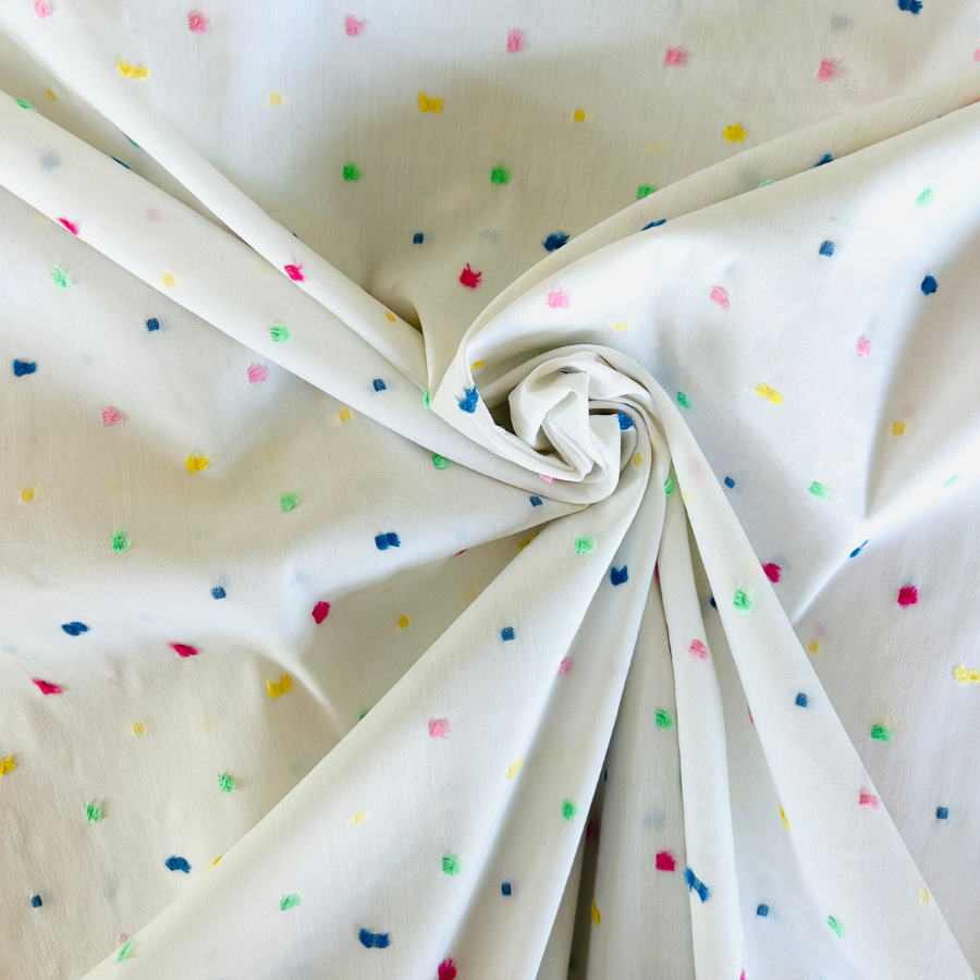 Tissu  coton plumetis de couleur