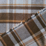 Tissu lainage manteau carreau écossais marron orange