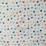 Tissu coton bio étoile multi couleur fond blanc