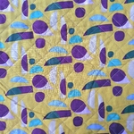 Tissu matelassé coton motifs abstraits violet jaune