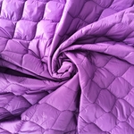 Tissu matelassé molletonné mauve imperméable. (1)