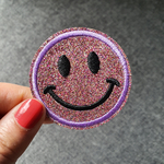 Patch thermocollant rond tête de smiley brillant mauve