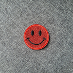 Patch thermocollant rond tête de smiley brillant rouge