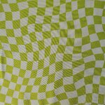 Tissu jersey damier asymétrique vert pomme et blanc