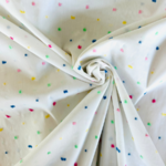 Tissu  coton plumetis de couleur
