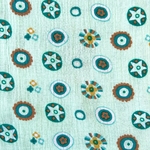Tissu double gaze vert motifs géométrique étoile marron ocre