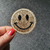 Patch thermocollant rond tête de smiley or (1)