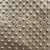 Tissu polaire minky uni à pois beige