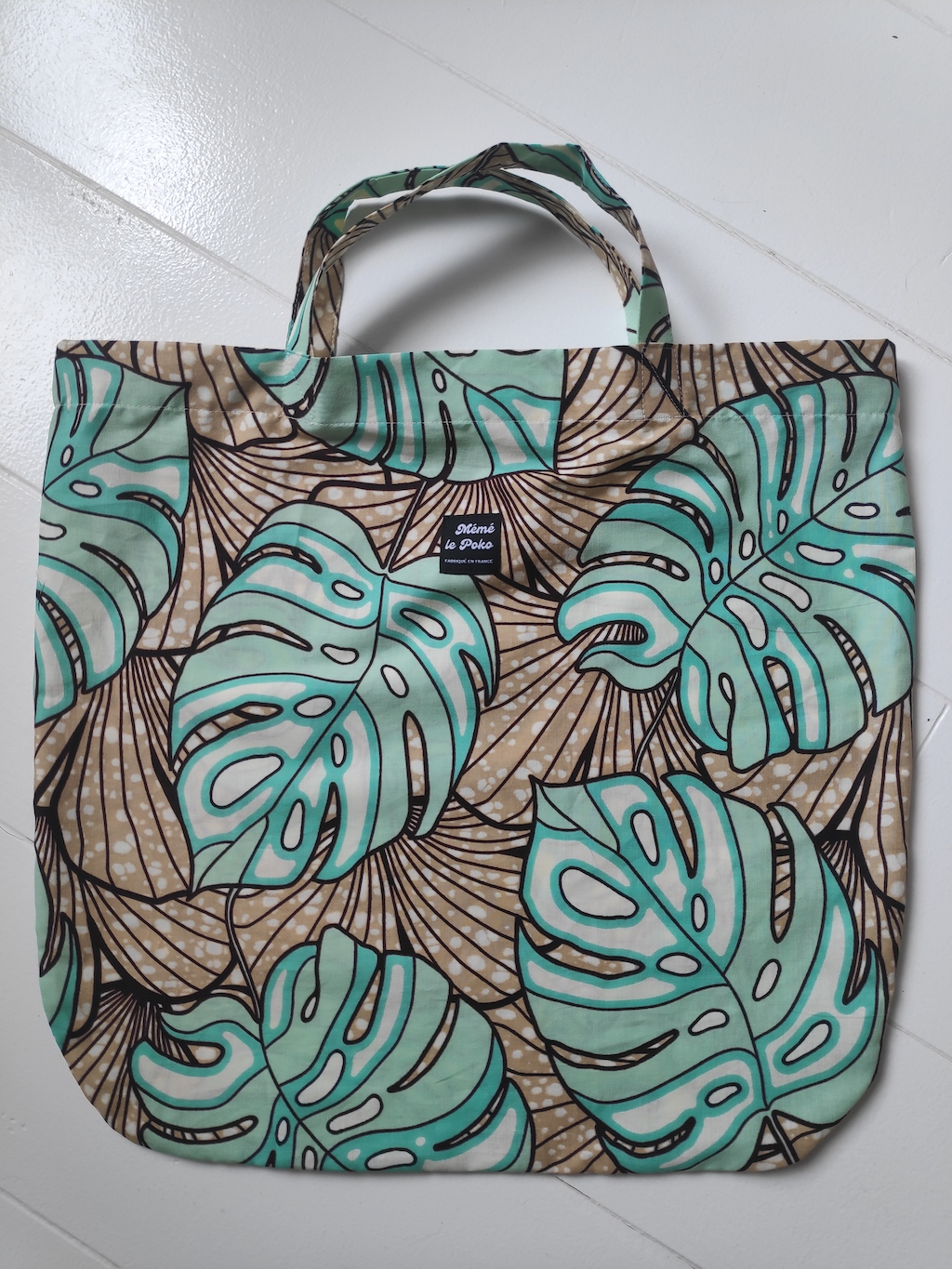 sac Julia_motif_plante_exotique_vert_pale_fond_marron