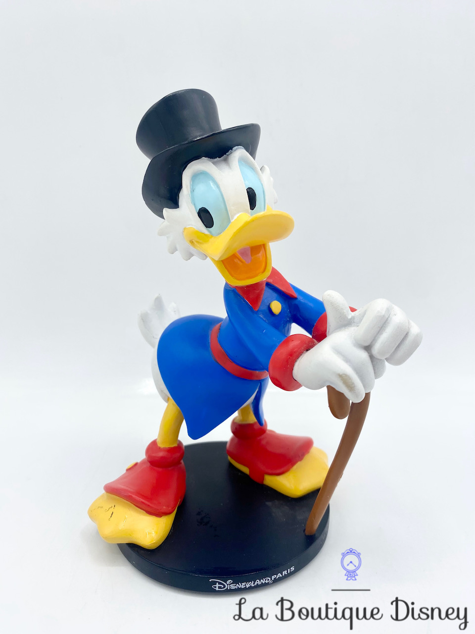 Figurine résine Oncle Picsou Disneyland Paris Disney socle noir 13 cm
