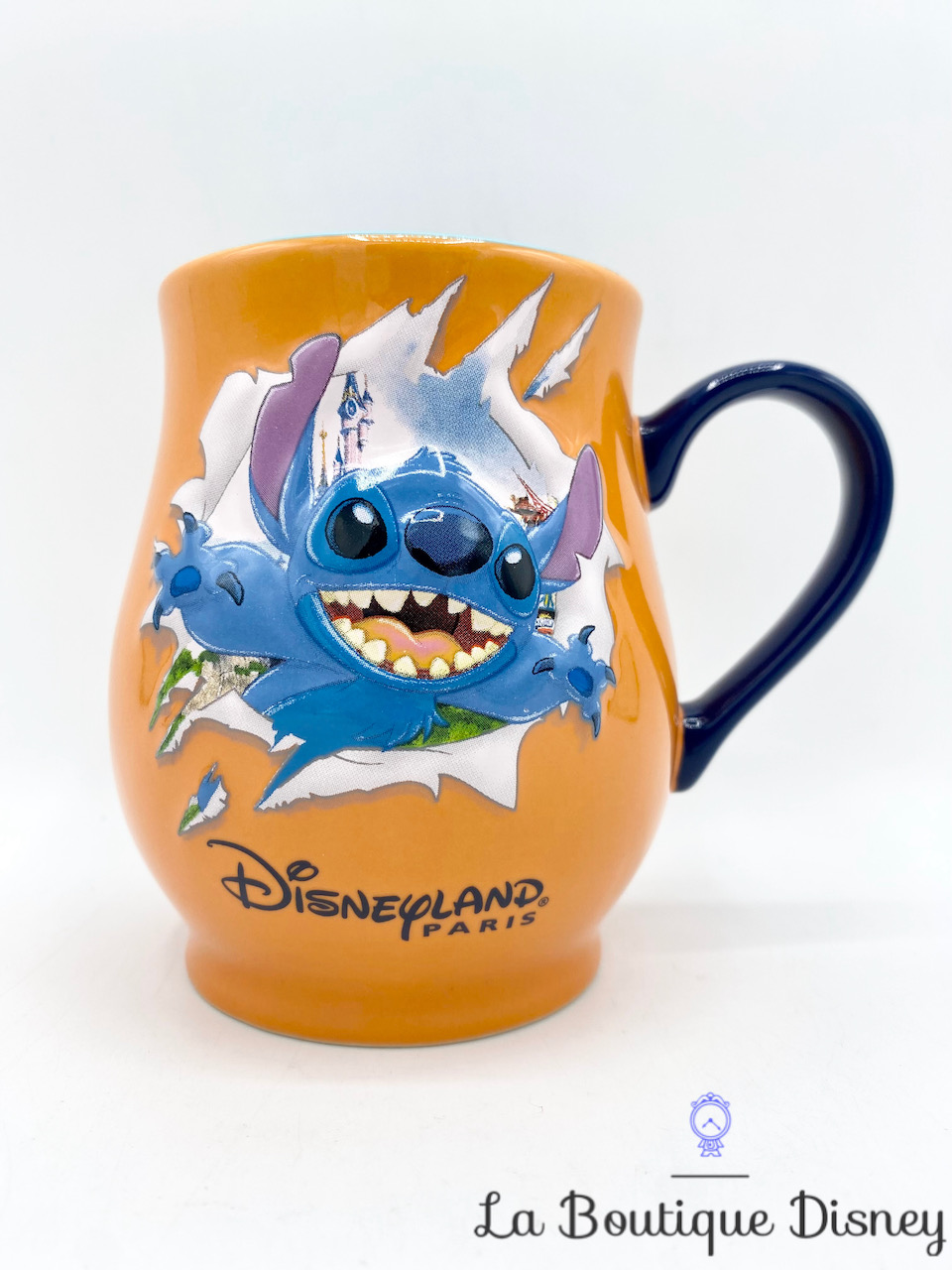 Tasse Stitch Disneyland Paris mug Disney trou déchiré orange monstre bleu