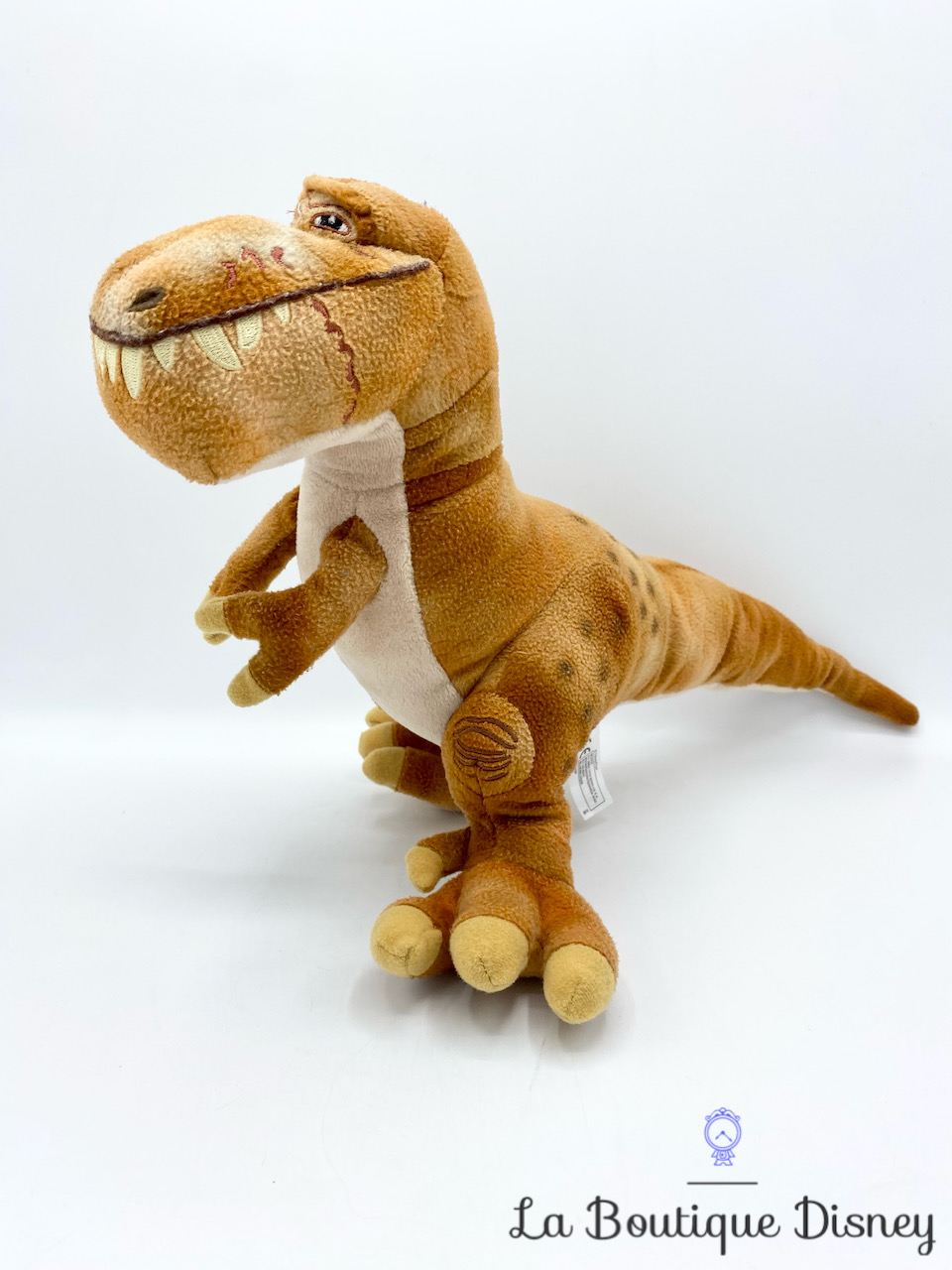 Peluche Butch dinosaure Le voyage d\'Arlo Nicotoy Disney marron 26 cm