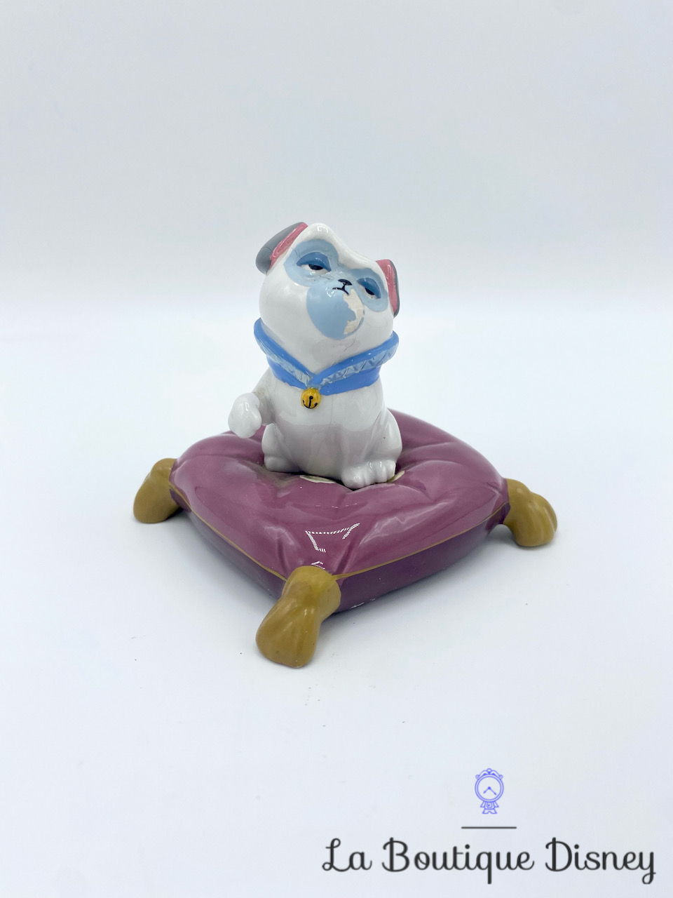 Figurine céramique porcelaine chien Percy Pocahontas Disney coussin vintage