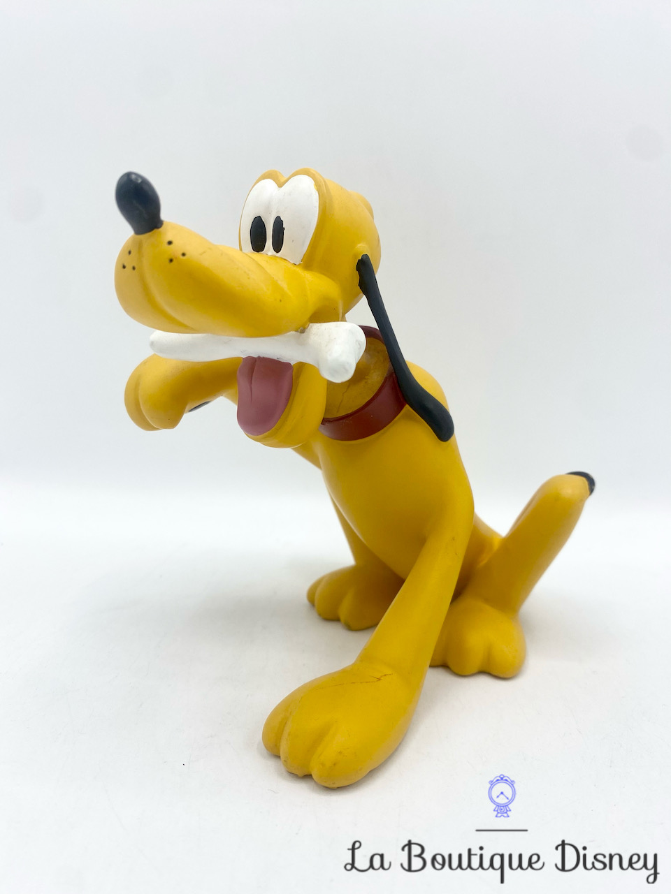Figurine Pluto Os Démons et Merveilles Disney résine chien jaune 14 cm