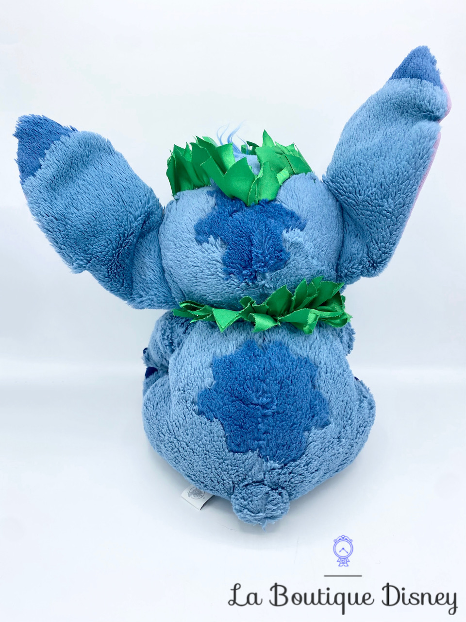 Peluche Stitch Hawaiien Disneyland Disney monstre bleu fleurs feuilles 38  cm - Peluches/Peluches Disneyland - La Boutique Disney