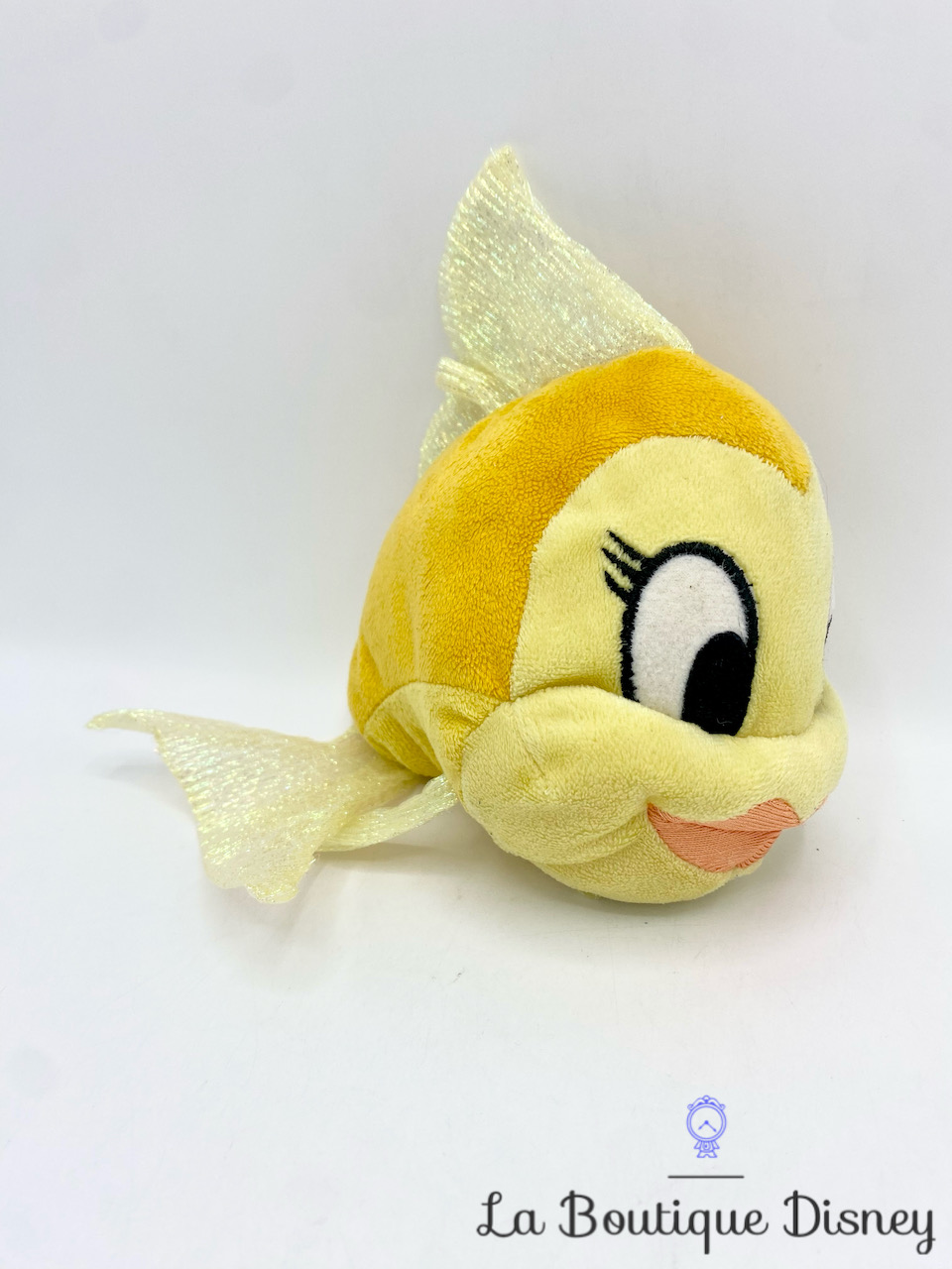 Peluche Cléo poisson Pinocchio Disney Store jaune maquillé 14 cm