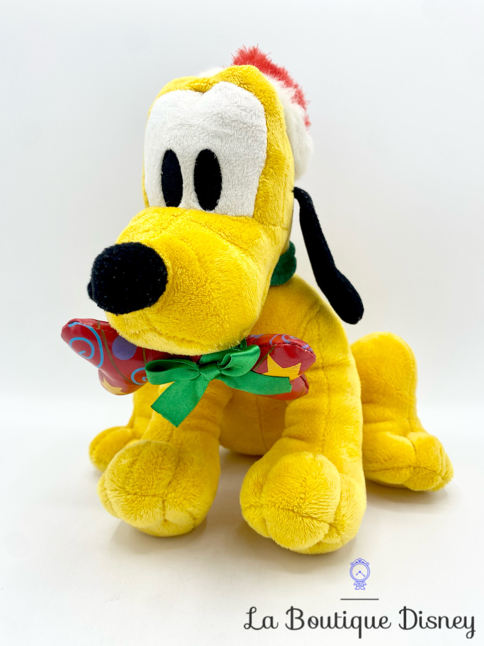 Peluche Pluto Os Noël Disneyland Disney bonnet chien jaune Père Noël 24 cm