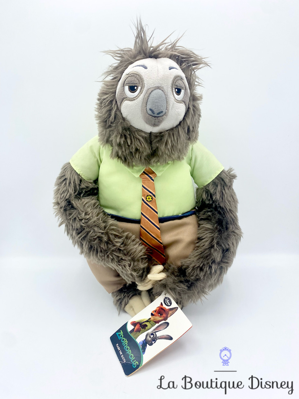 Peluche Flash Slothmore Zootopie Disney Store paresseux cravate 38 cm