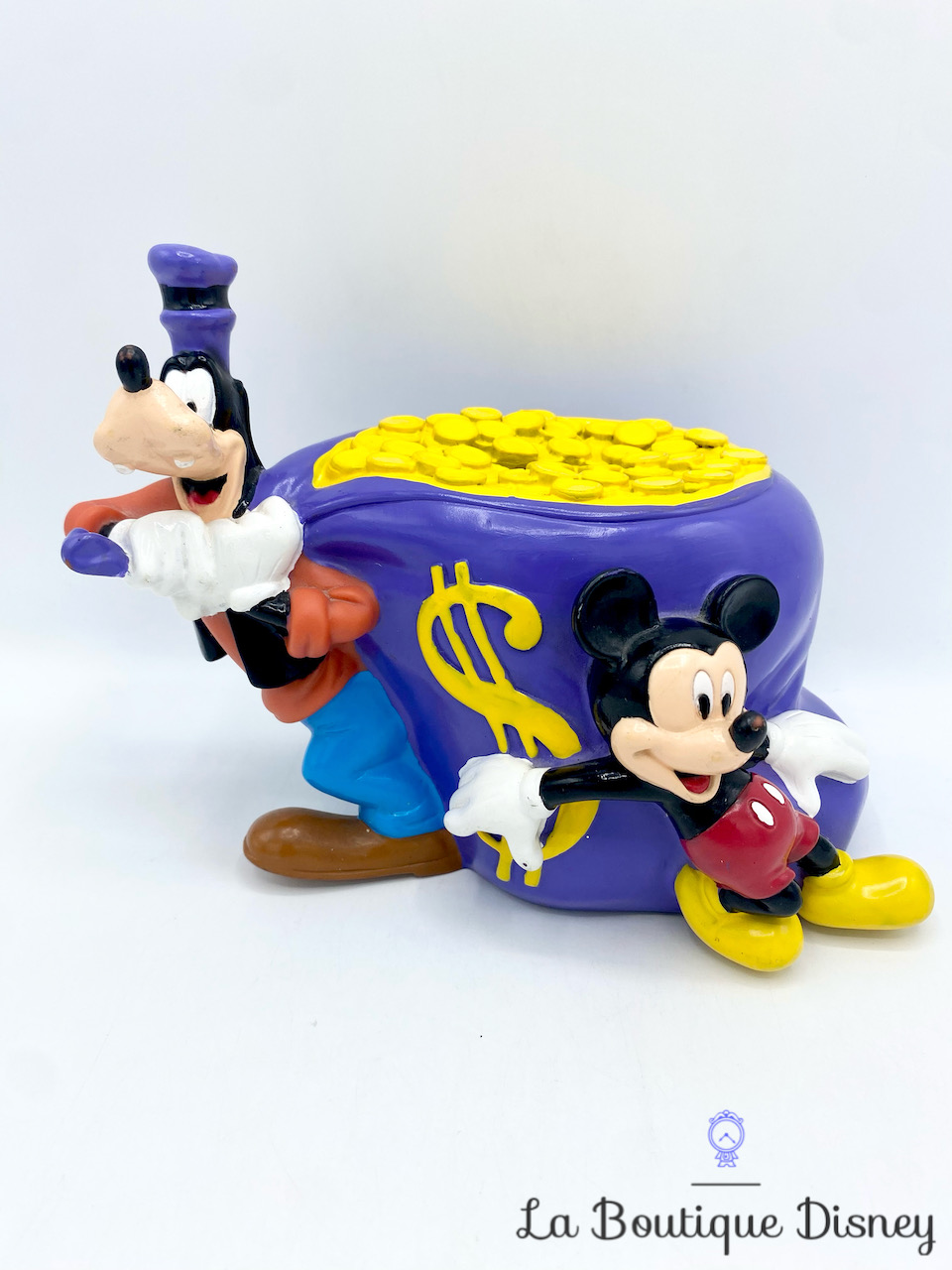 Tirelire Mickey Dingo dollar Disney MFG Monogram plastique violet bourse argent
