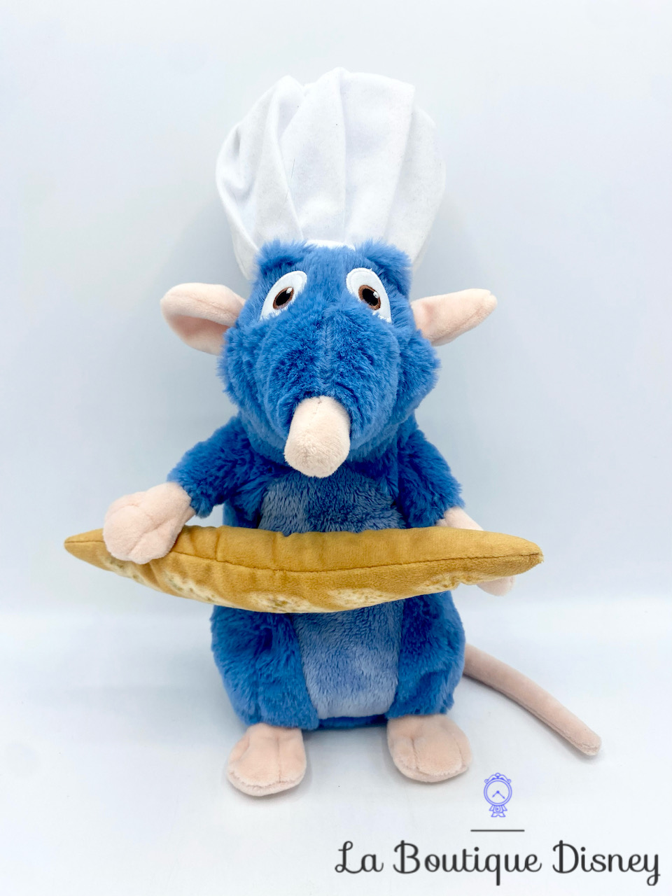 Peluche Rémy pain Ratatouille Disney rat bleu cuisinier baguette 30 cm