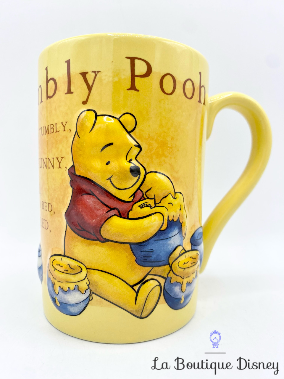 Tasse Winnie l\'ourson Rumbly Tumbly Pooh Disney Store Exclusive mug jaune relief 3D