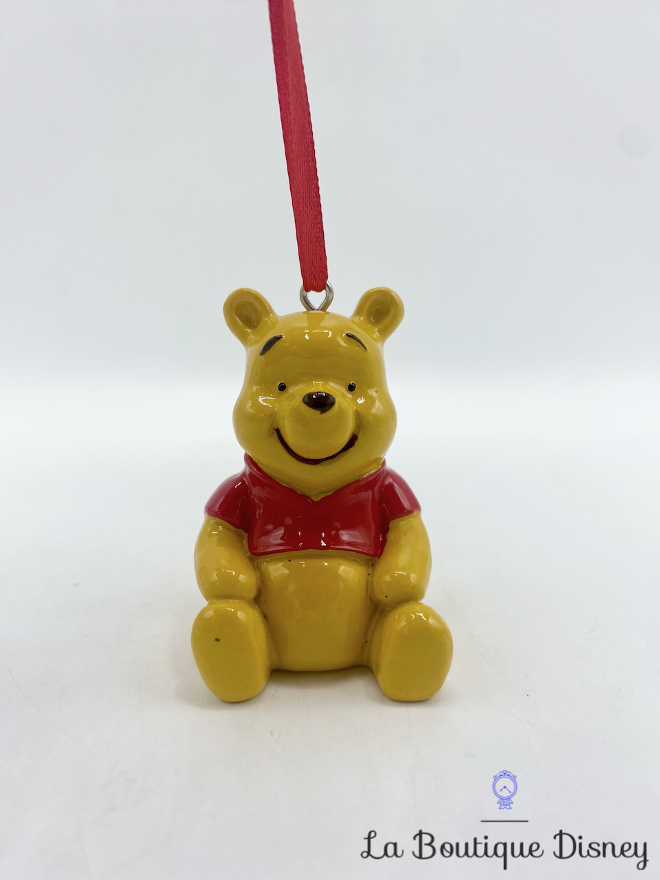 Ornement Noël Winnie l\'ourson Disney Primark boule suspension plastique